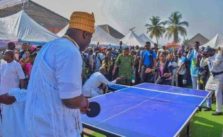 ooni plays table tennis with children