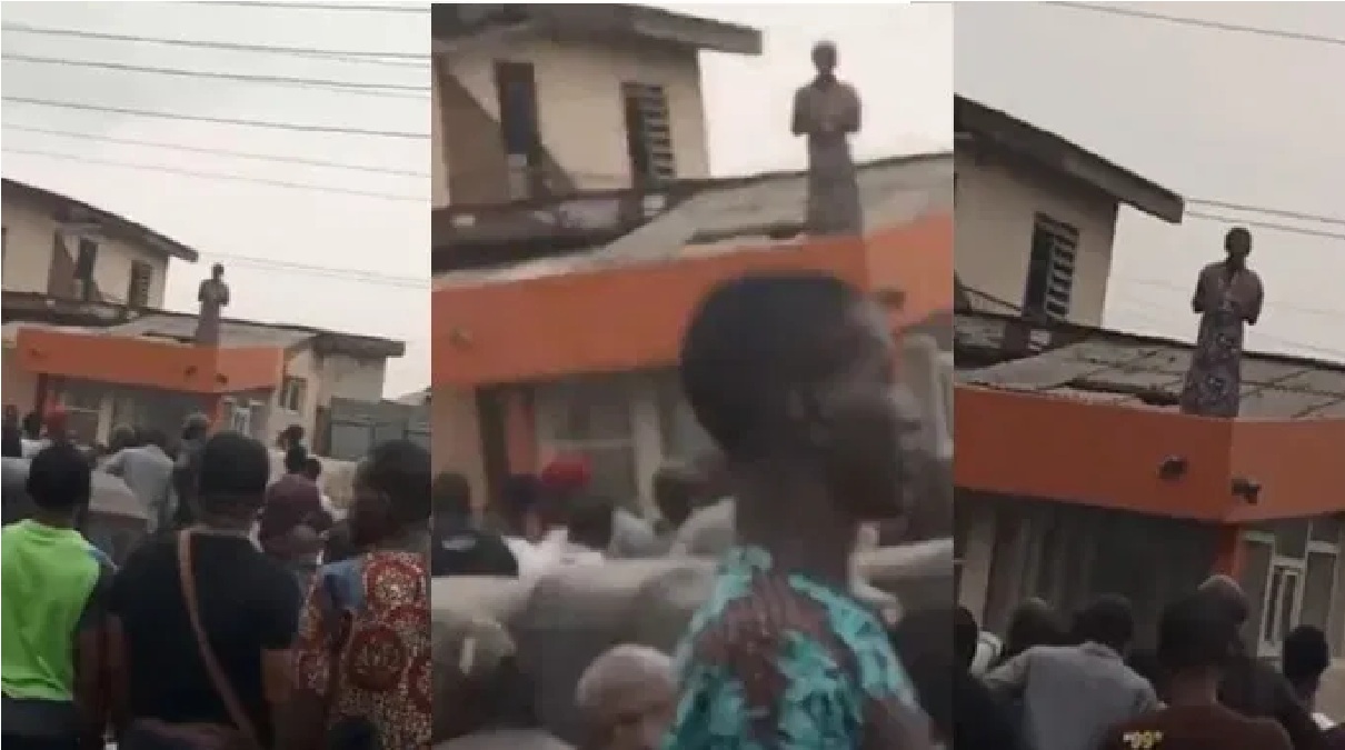 Woman mysteriously lands on top a building in Lagos
